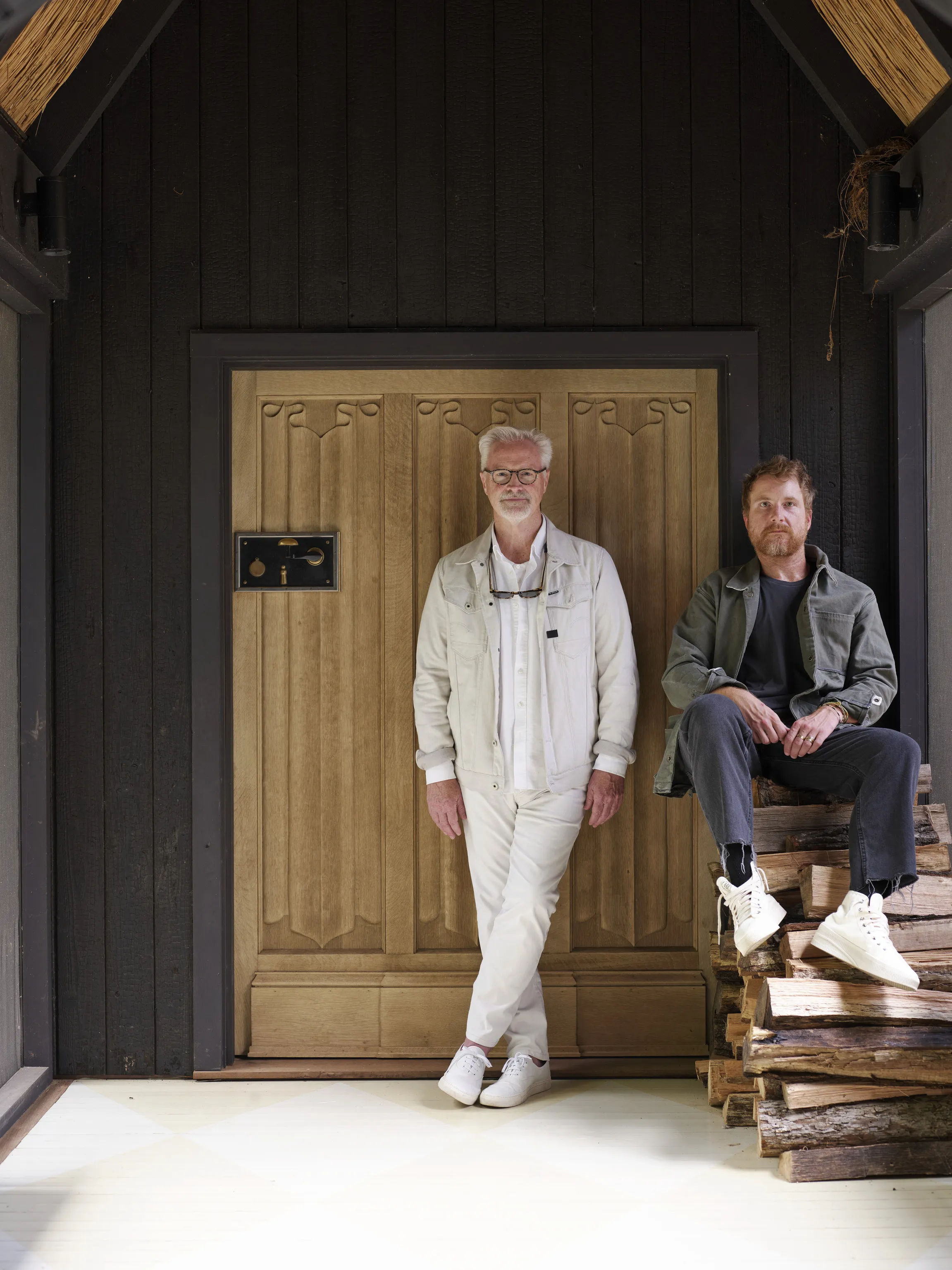 "Lakeside Reverie" photo of Bobby McAlpine & Blake Weeks at the front door.