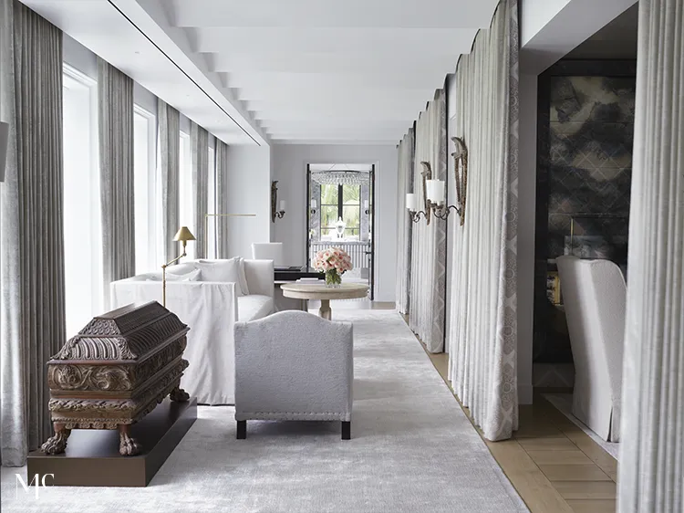 long white hallway with wood floors