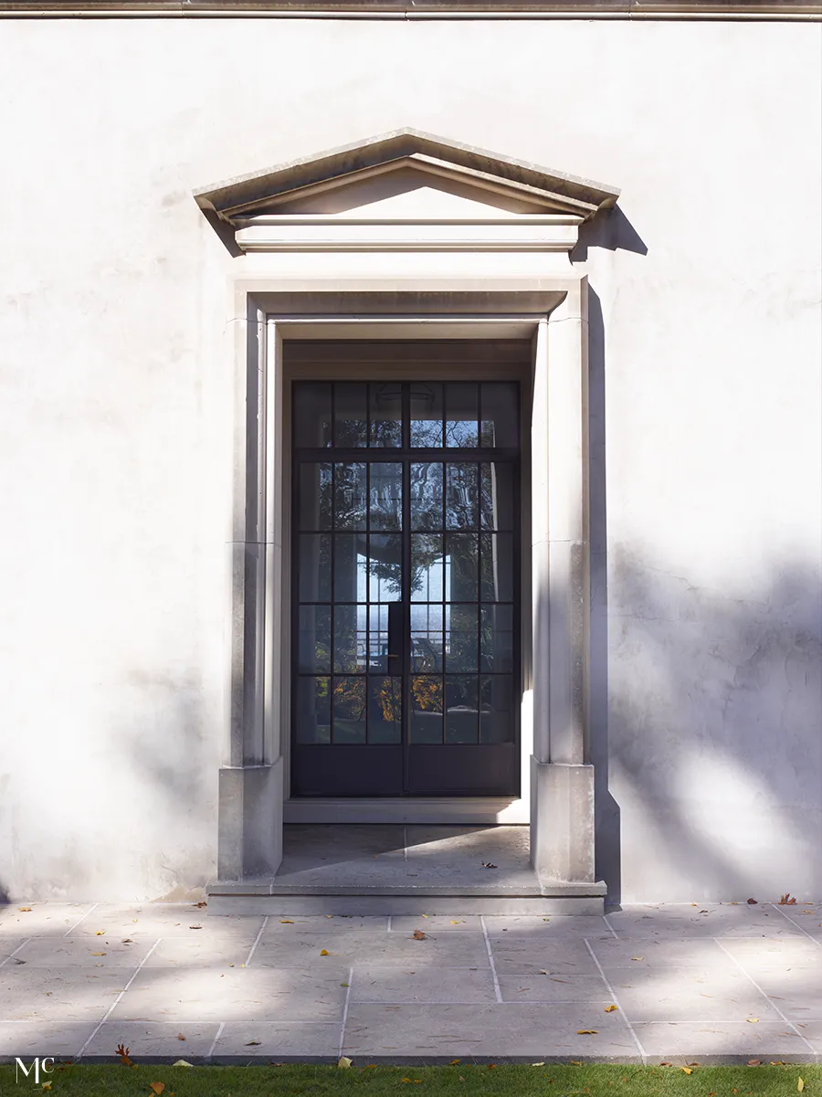 white wall with large door