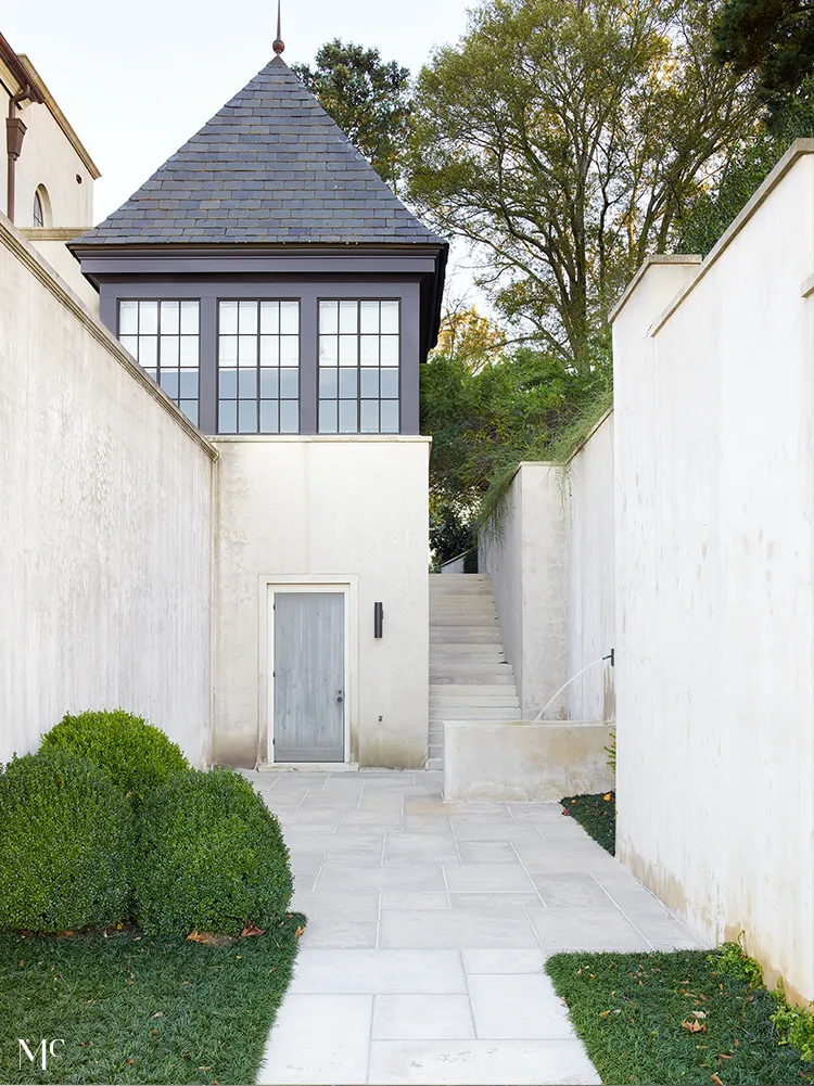 Back wall and entrance to an English-style mansion, with modern architectural details